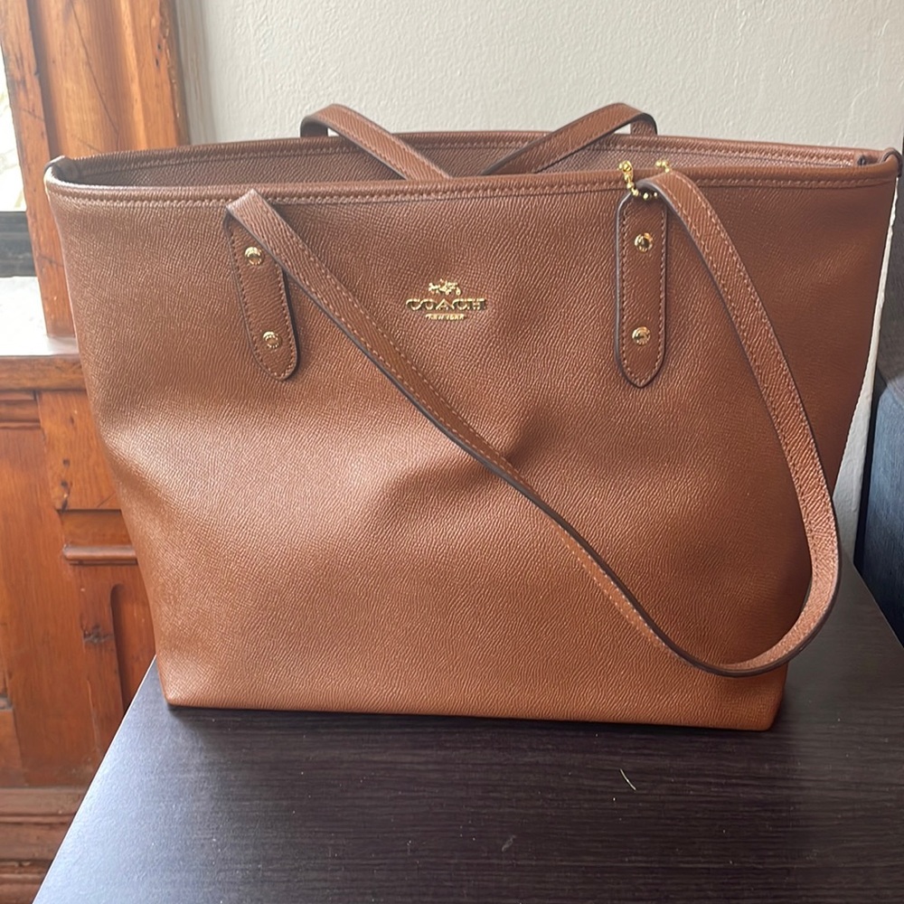 Never been used with tags Coach City Zip tote in brown